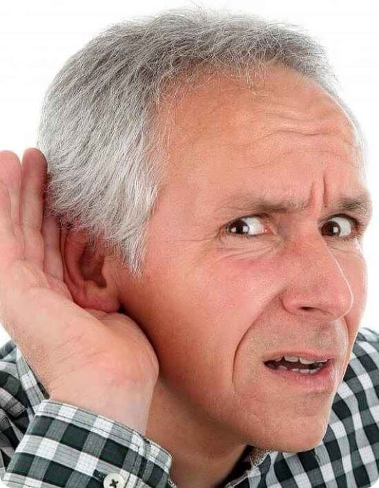 Man making hard of hearing sign